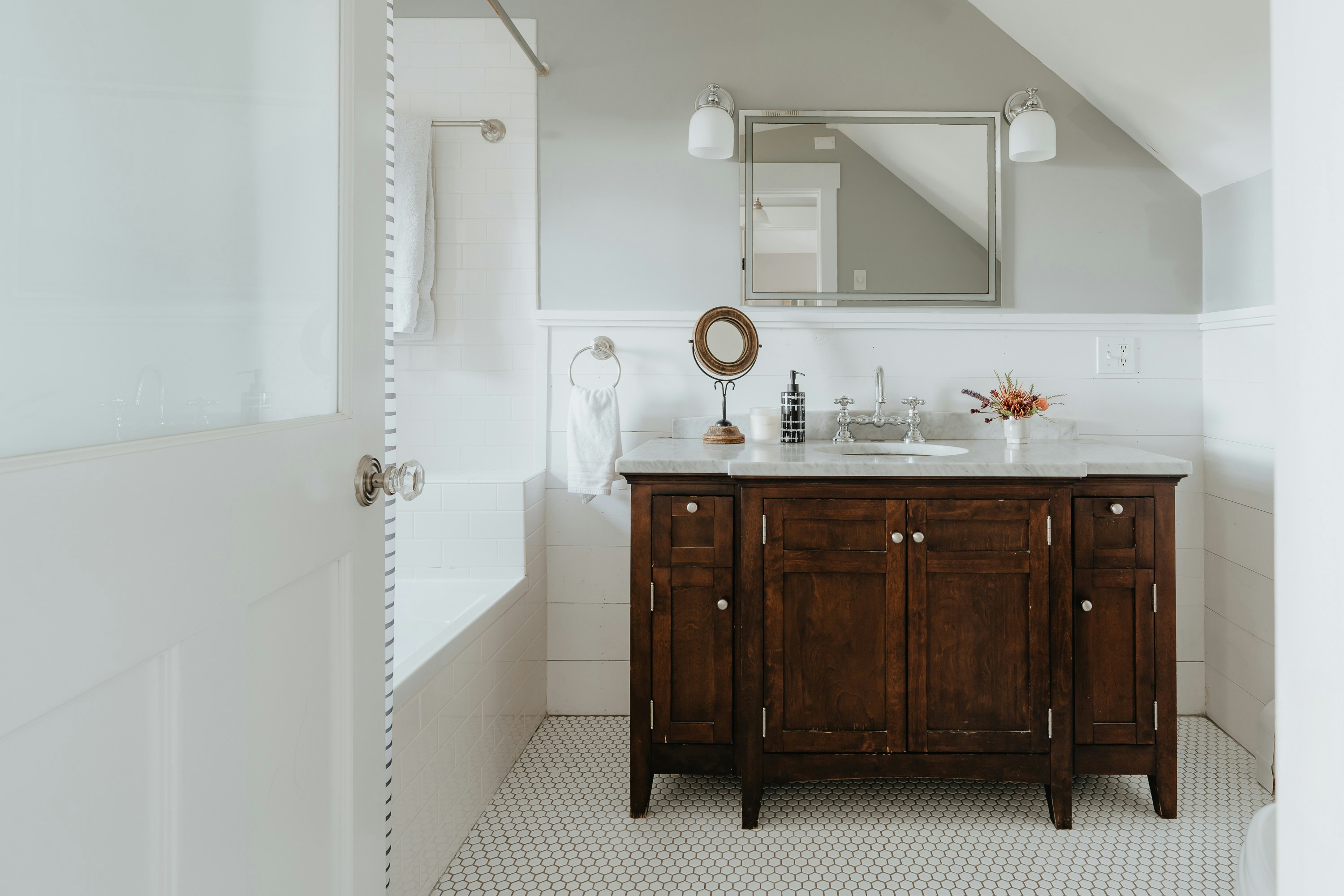 Traditional Houston bathroom cabinets with classic styling and warm finishes